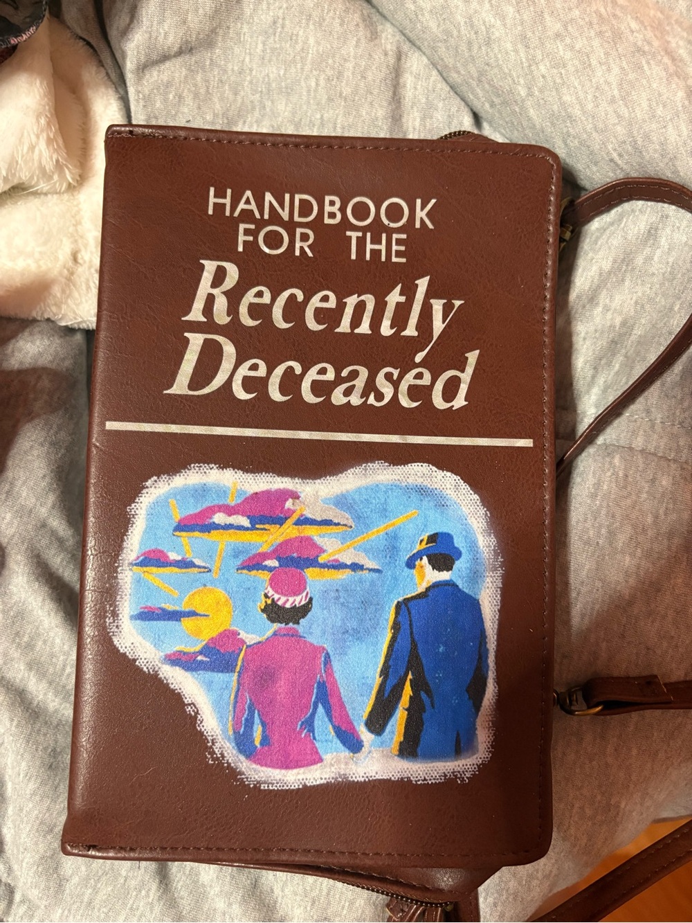 Handbook for the Recently Deceased Brown Crossbody Bag